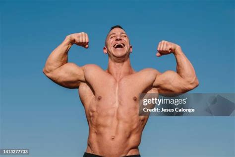 50,972 Muscle Man Stock Photos & High